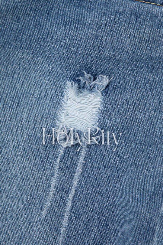Jupe asymétrique en jean à ourlet effiloché