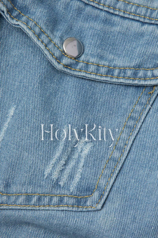 Jeansjacke mit zerrissenen Taschen