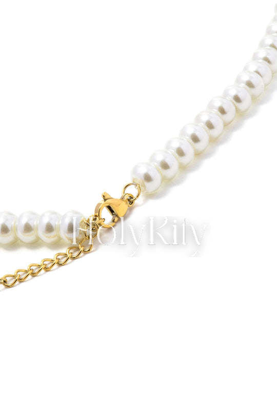 Collier de perles avec breloque en forme de cœur