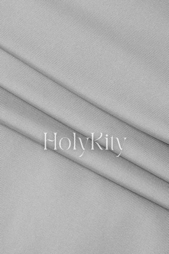 Set aus asymmetrischem Neckholderkleid aus Netzstoff und Bolero mit Krawatte