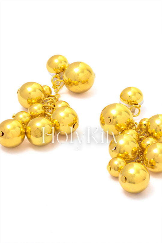 Boucles d'oreilles pendantes à boules métalliques