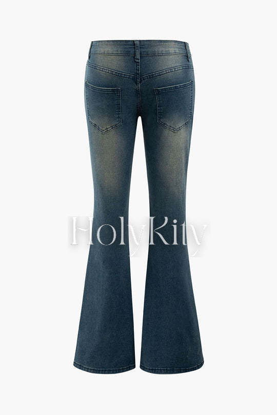 Jean bootcut délavé et vieilli