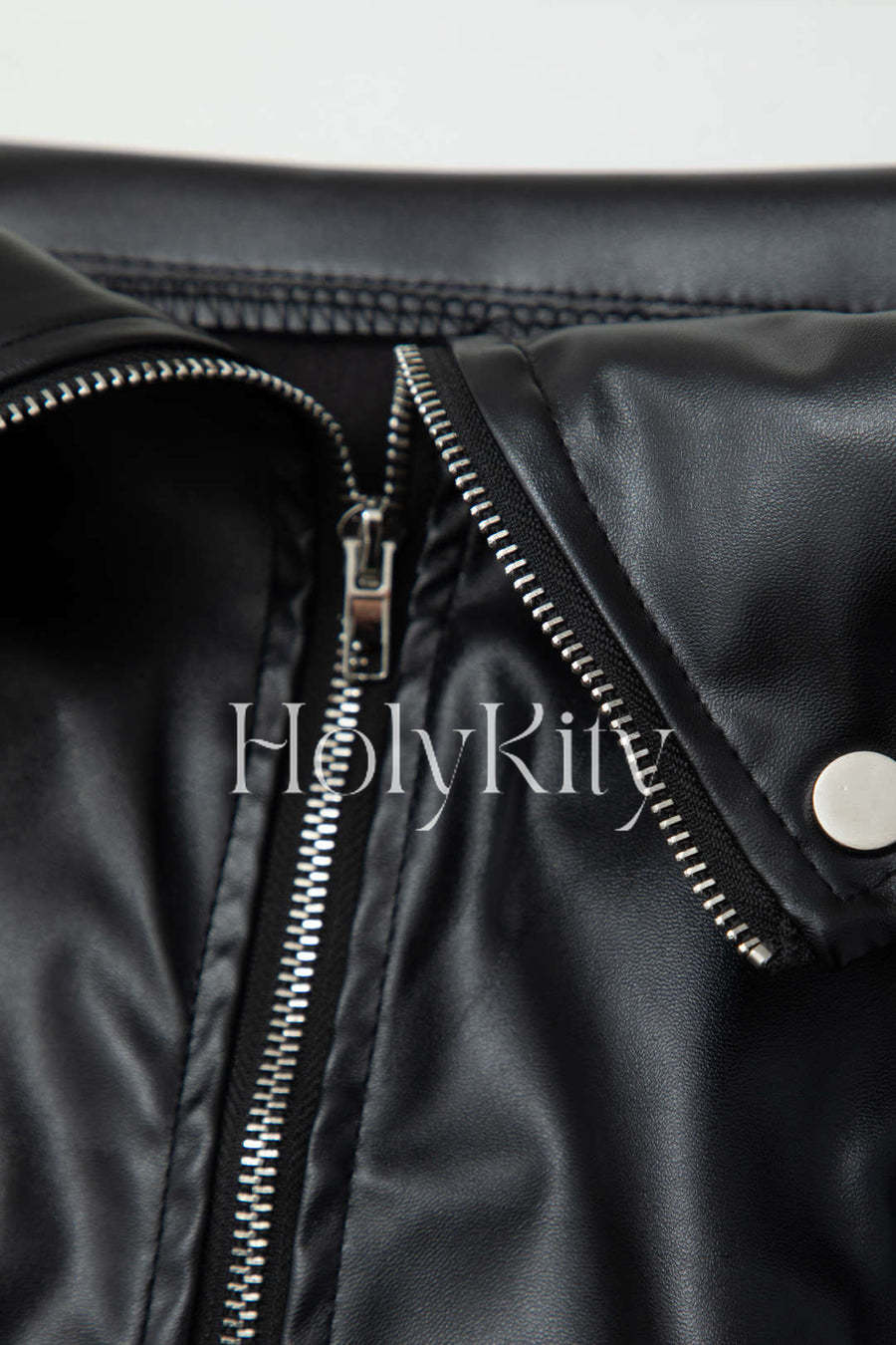 Mini-jupe zippée en similicuir à taille rabattable