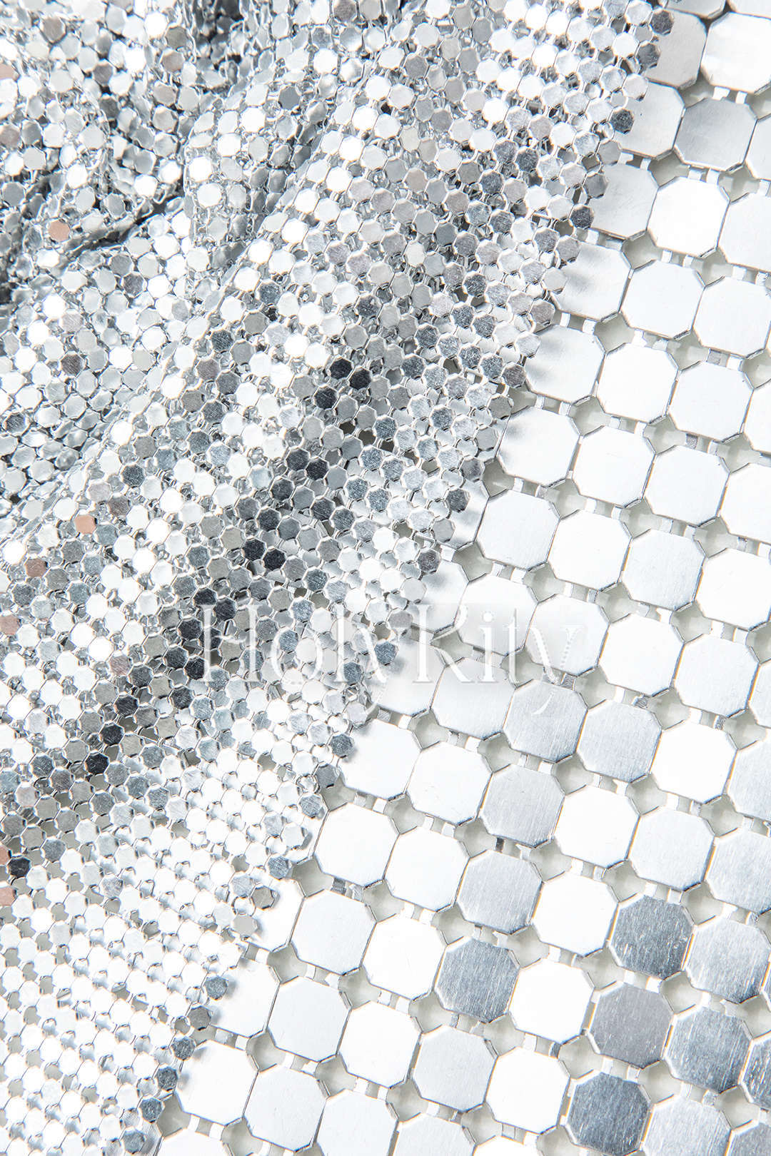Mini-jupe fendue à empiècements en sequins