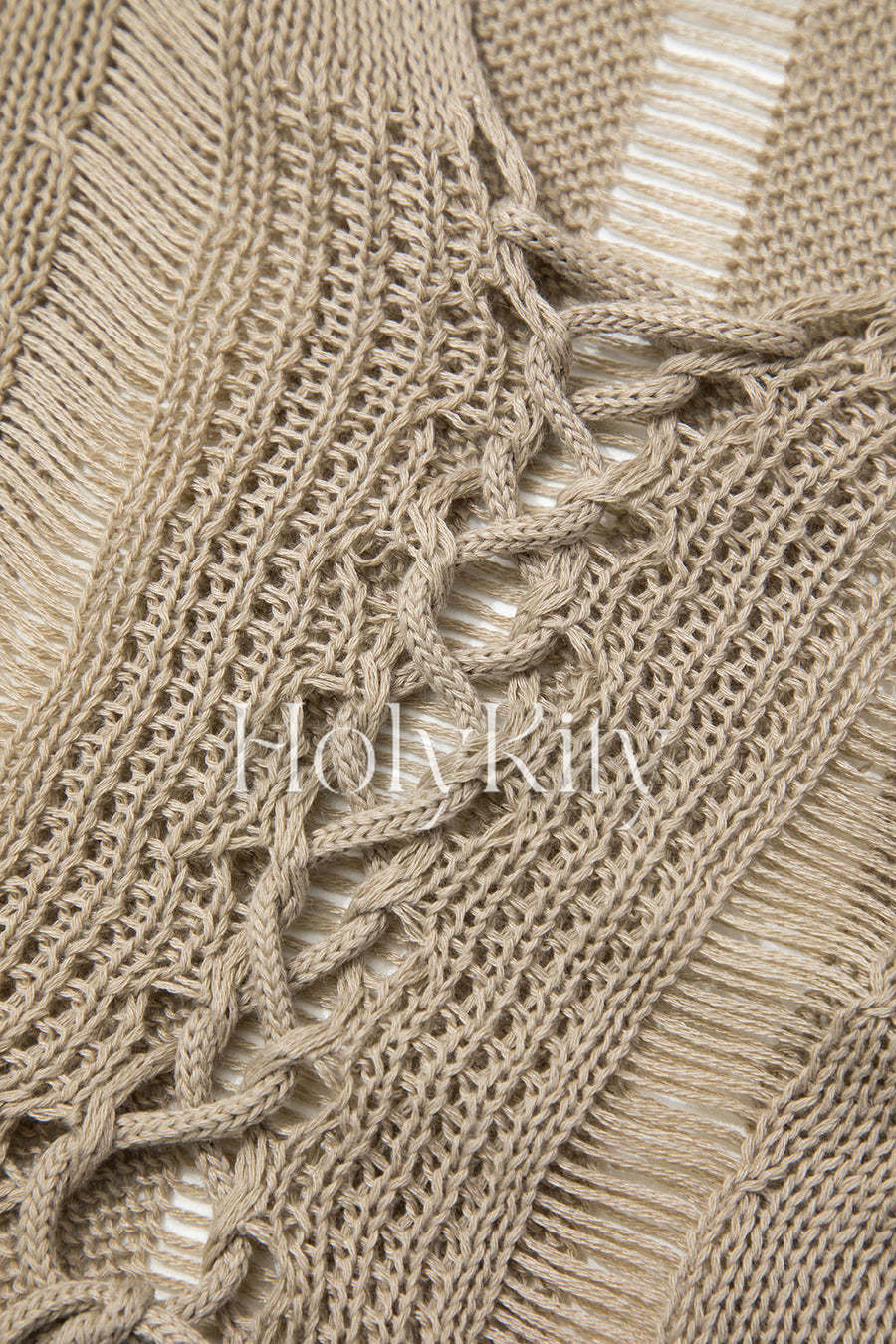 Haut à manches longues en tricot déchiré noué sur le devant