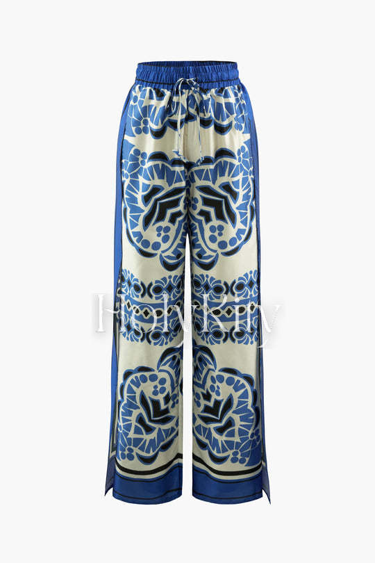 Bedruckte Hose mit Kordelzug und Schlitz am Saum