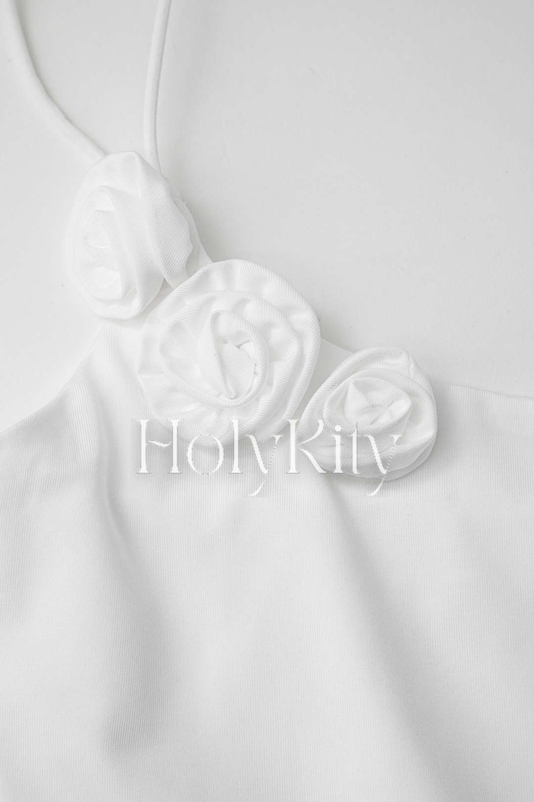 Robe longue à ourlet asymétrique et fleurs 3D 
