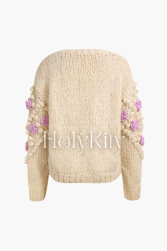 Strickjacke mit Blumen-Pom-Pom 