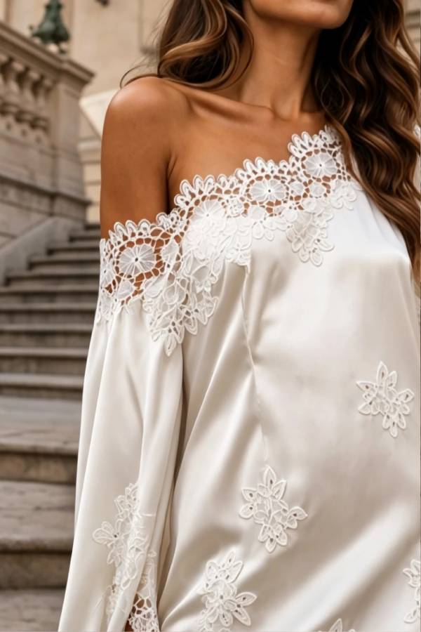 White satin mini dress with one-shoulder lace paneling
