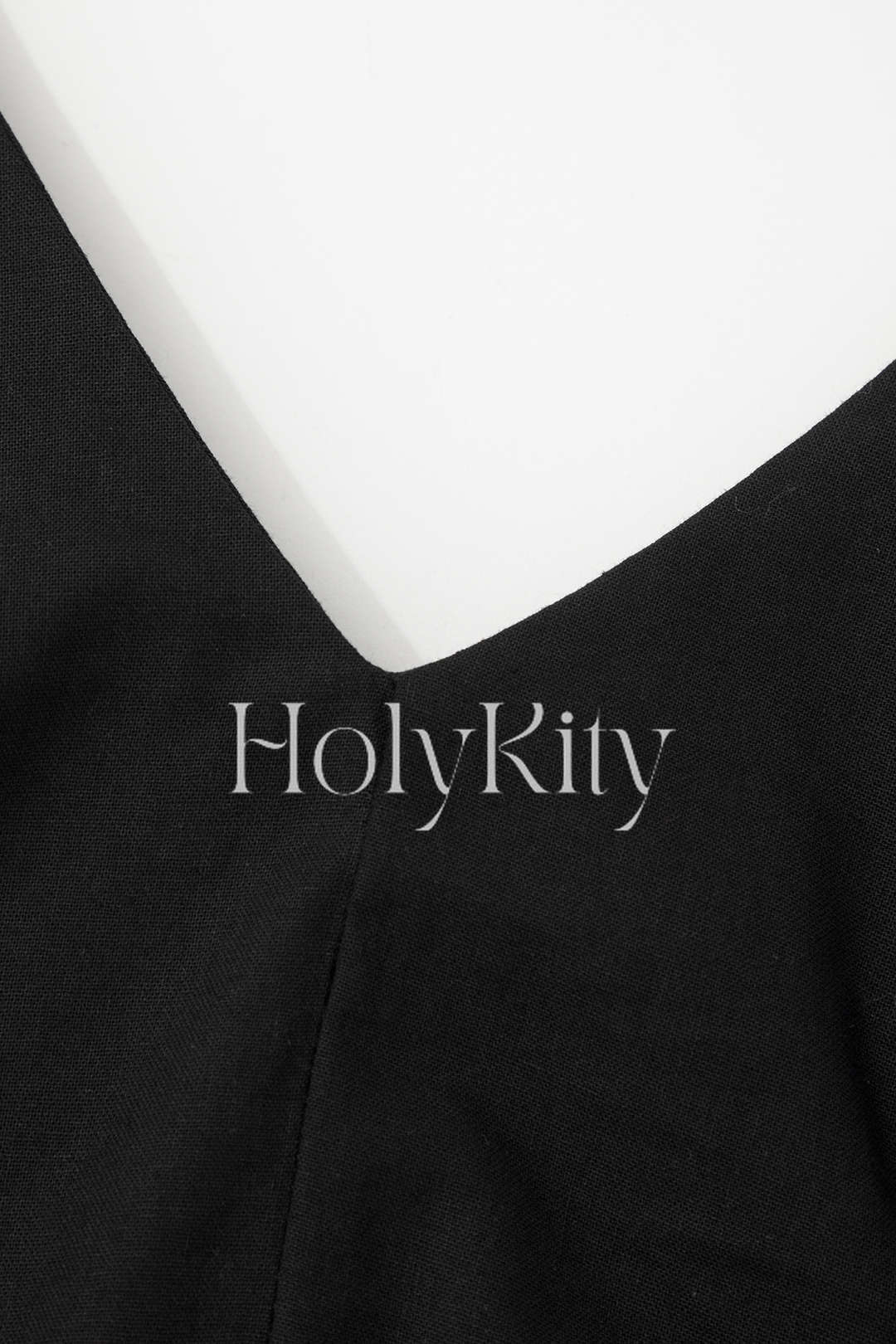 Robe longue sans manches à col en V et fente sur le devant 
