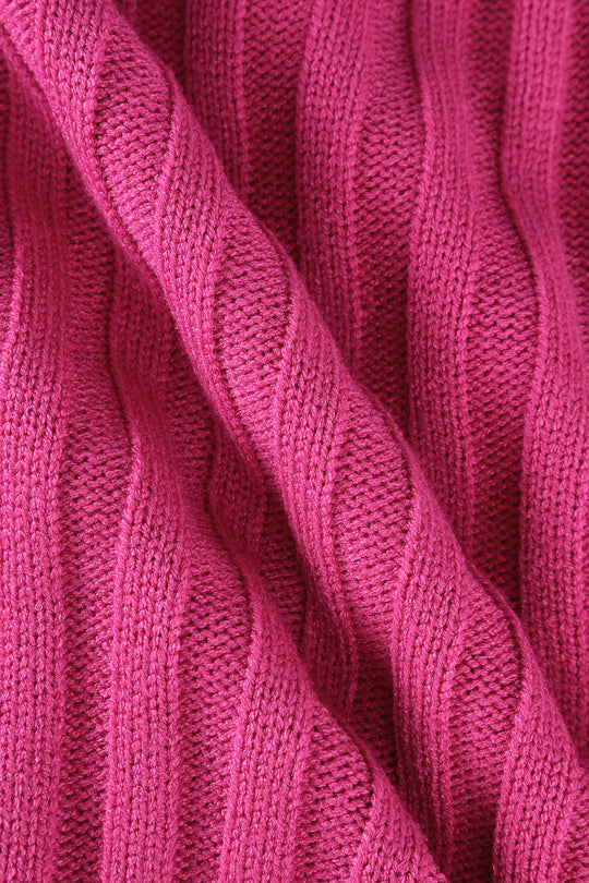 Haut asymétrique en tricot à col montant et bordure en laitue 