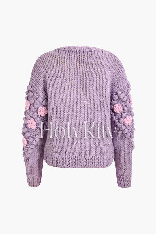 Strickjacke mit Blumen-Pom-Pom 