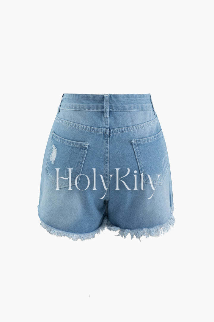Short en jean effiloché et déchiré