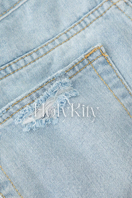 Short en jean effiloché et déchiré 