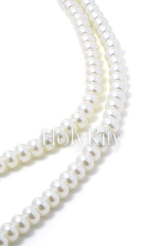 Collier de perles avec breloque en forme de cœur 