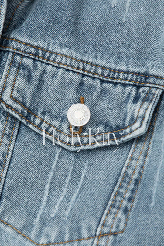 Veste en jean déchirée avec poche poitrine 
