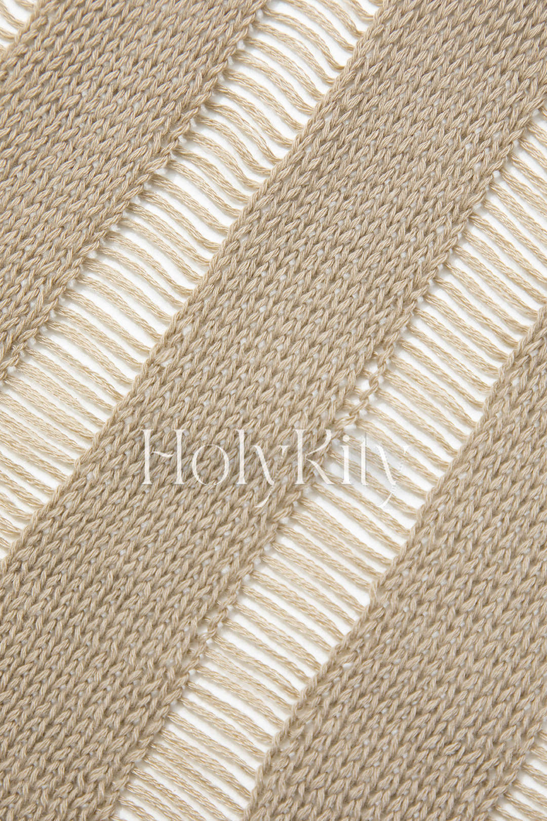 Haut à manches longues en tricot déchiré noué sur le devant 