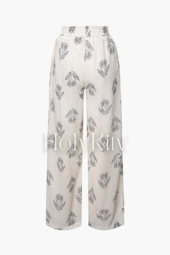 Bluse mit V-Ausschnitt und Knoten vorne und Hose mit Schlitz am Saum 
