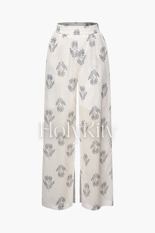 Bluse mit V-Ausschnitt und Knoten vorne und Hose mit Schlitz am Saum 